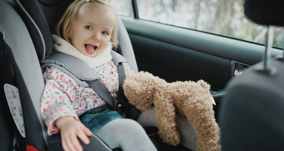 toddler in car